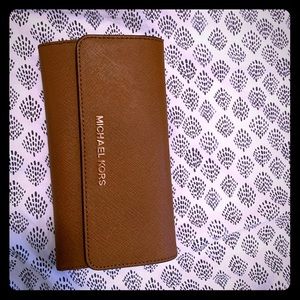 Michael Kors Bags - Michael Kors luggage colored wallet Michael Kors Bags - Michael Kors luggage colored wallet